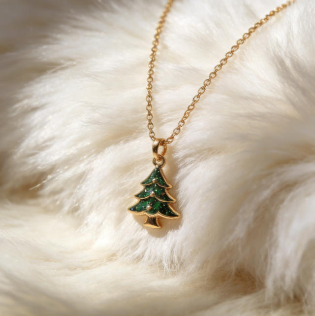 A beautiful necklace in a gift box under a Christmas tree