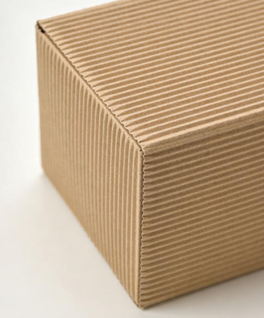 A wet and damaged corrugated box
